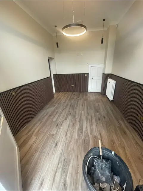 Finished room with panelling and new floor