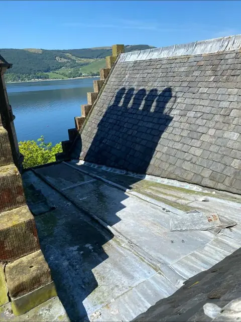 Lead and slate roof overlooking the water