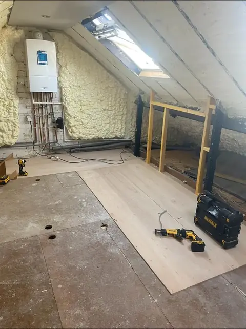Spray-foam insulation, pipework and boiler fitted