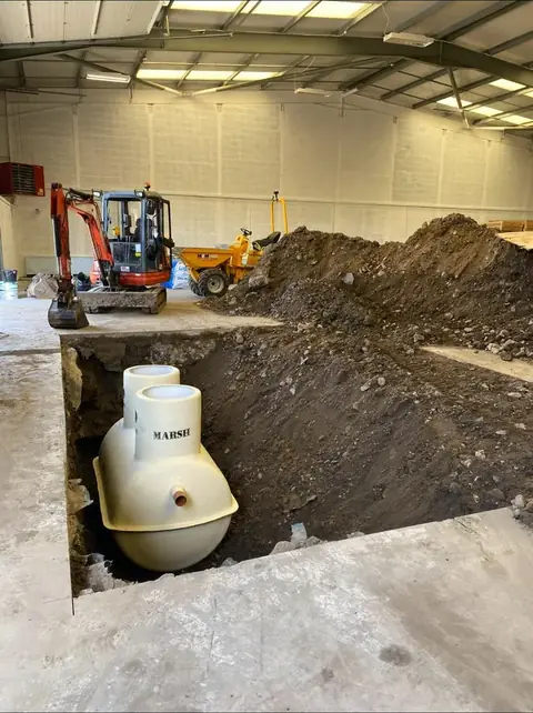 Tank set in the ground
